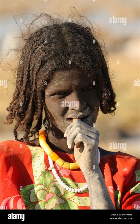Young Afar Girl Standing In Lake Abbe In Djibouti Horn Of Africa Stock