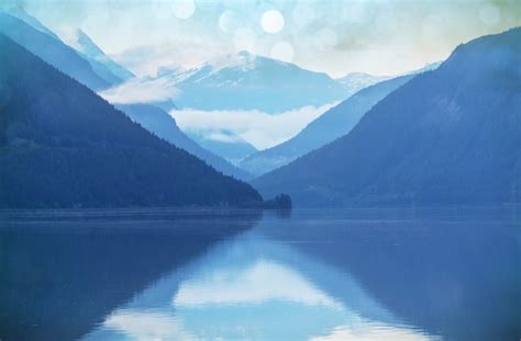 Premium Photo Serene Scene By The Mountain Lake In Canada With