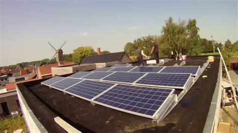 Most uk solar panel system installs comprise of around 12 panels. Installing Solar Panels on a flat roof - ENVICE BVBA - YouTube