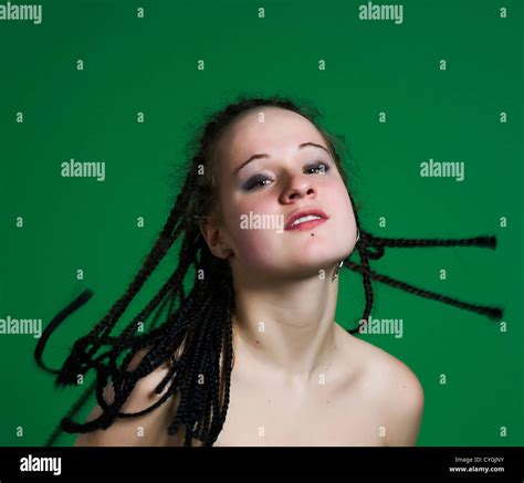 Sexy Gothic Woman With Dreads Wearing Bdsm Outfit On Green Background