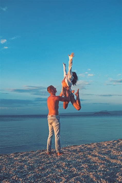 Girl And Man Jump On Sand Happy Family On Valentines Day Love Relations Of Naked Couple At Sea