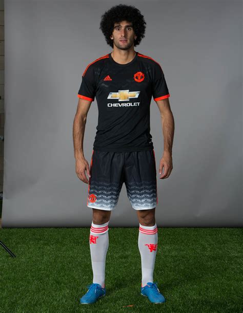 The shirt features white and black diagonal stripes in what is a very bold look. Adidas Manchester United 15-16 Third Kit Released - Footy ...