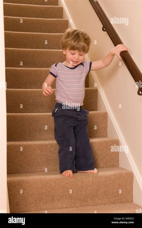 Boy Toddler Two Year Old Walking Down Stairs Stock Photo Alamy
