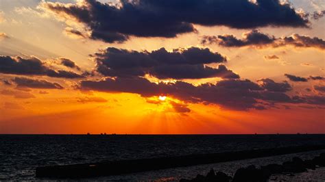 Download Wallpaper 1280x720 Sunset Sea Sun Clouds Landscape Hd Hdv