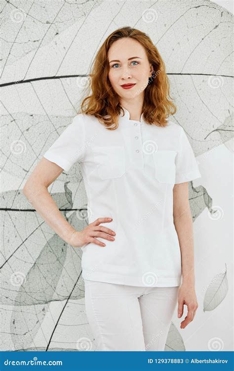 Confident Beauty Salon Female Owner Looking At Camera Over Wall Background Stock Image Image