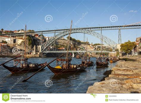 View Of The Douro River With Rabelo Boats The Iconic Dom Luis Bridge