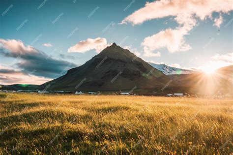 Premium Photo Sunset Over Stapafell Mountain And Glowing Meadow In