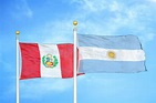 Peru and Argentina Two Flags on Flagpoles and Blue Sky Stock Image ...