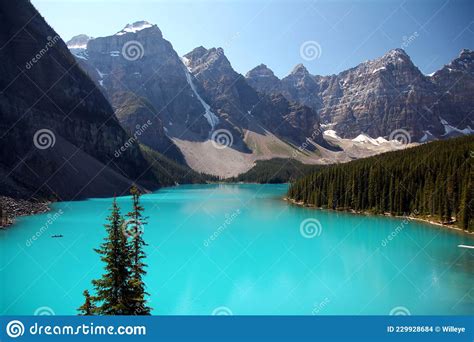 The Turquoise Waters Of Moraine Lake And The Peaks Around It Stock