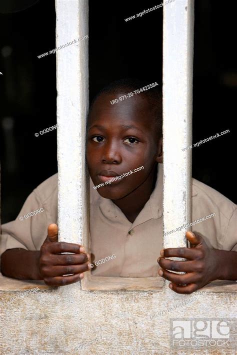 African Boy Behind Bars Togo Stock Photo Picture And Rights Managed