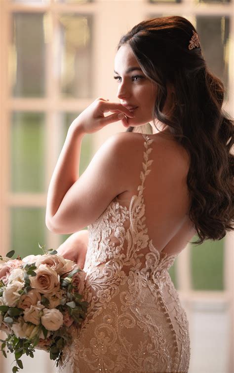 I bought this dress and ended up canceling my wedding so it has no alterations and has only been worn when i tried it on. Sexy Lace Wedding Dress with Shaped Train - Martina Liana