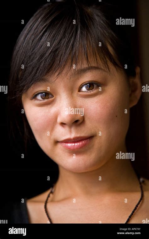Close Up Portrait Beautiful Asian Oriental Chinese Young Woman Big Brown Eyes Smiling Looking At