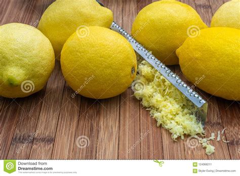 Just everyday table of contents. Lemons,lemon Zest And A Lemon Grater On A Wood Cuttingboard Stock Image - Image of ragged ...