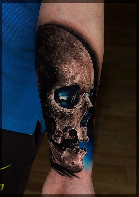 Koh phi phi skull tattoo on half sleeve. Realistic Skull With Blue Background | Best tattoo ideas ...