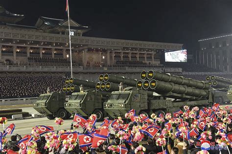 north korea parades its weapons