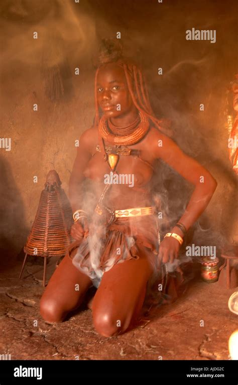 Namibia Kaokoland Himba People Himba Woman Burning Herbs To Cleanse