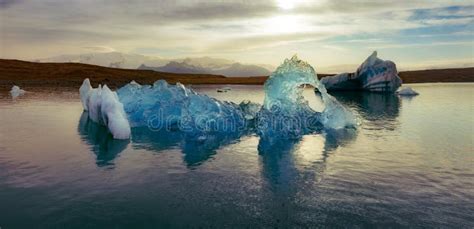 Panoramic Evening View Of Icebergs In Jokulsarlon Glacier Lagoon
