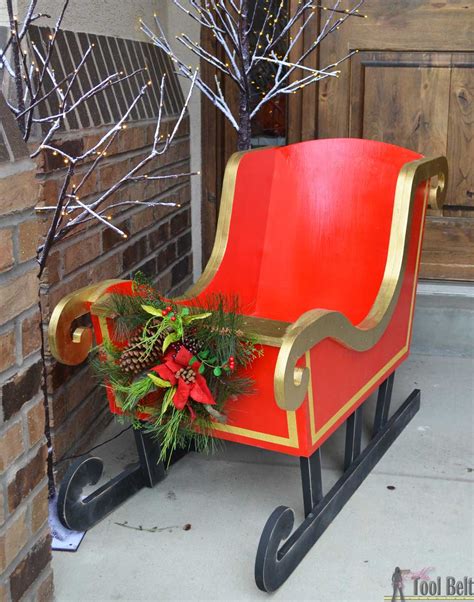The sparkling and twinkling lights on the walls and edges of a house makes. DIY Santa Sleigh - Her Tool Belt