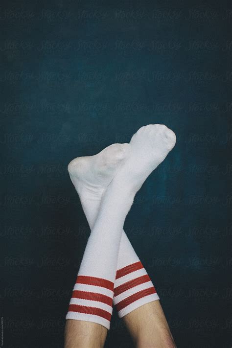 Feet Upward With White Socks By Stocksy Contributor Vera Lair