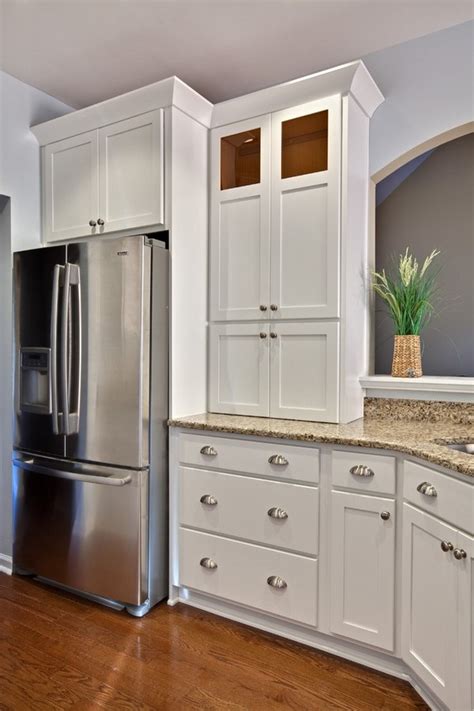 Our white shaker elite cabinets brighten up this customer's kitchen, complemented by matte black hardware and a sleek white subway tile backsplash. Shaker cabinets - Clean, simple, functional and visually ...
