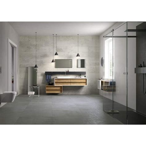 Gray flooring can be used in pretty much any setting including: Foundation grey | Concrete bathroom, Bathroom floor tiles, Grey bathroom tiles