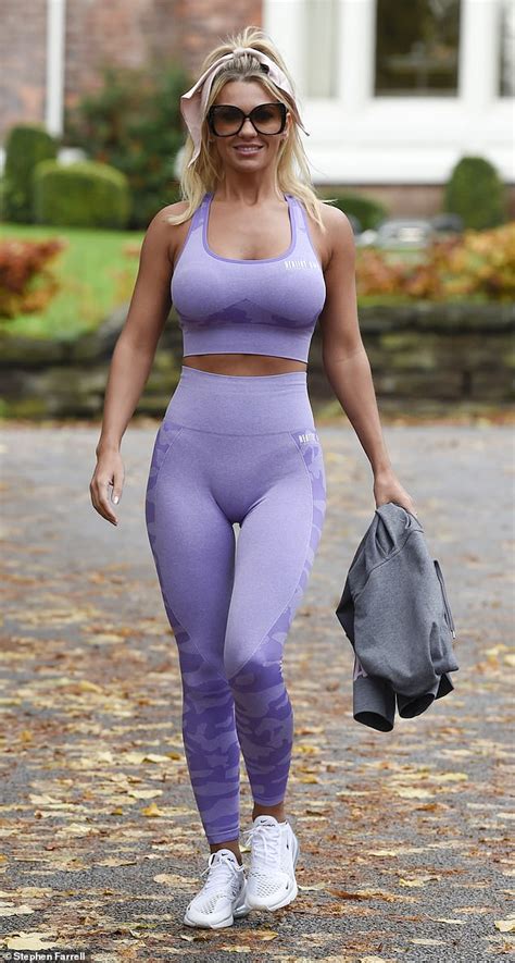 Christine Mcguinness Displays Her Sensational Physique In Purple Crop Top And Matching Leggings