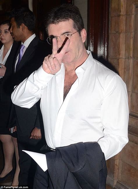 Simon Cowell Shows Off His Groomed Chest Hair With Undone Shirt As He