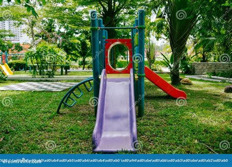 Children S Playground Plastic Slide And Tunnel Stock Photo Image Of