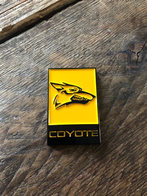 Coyote Emblem Yellow Black Now Buy Cheap At American Horsepower