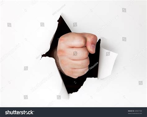 Mans Hand Punching Hole Through White Stock Photo 44067100 Shutterstock