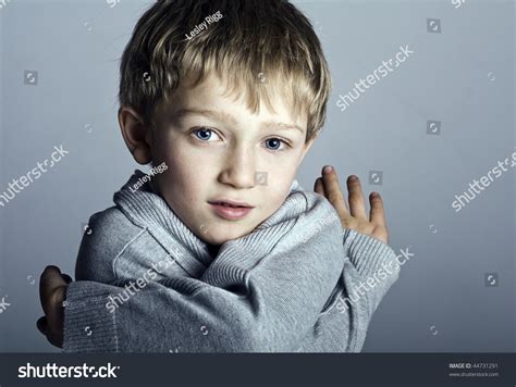 An Adorable Blonde Boy Child Of Seven Years Old Stock Photo 44731291