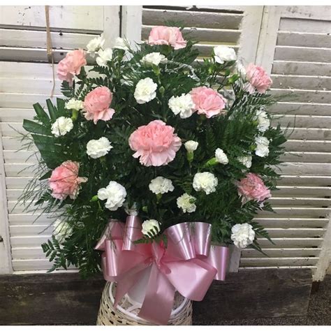 The main feature of japanese ikebana, is that the purposes of the flower arrangement are not limited to a pure aesthetic factor. Traditional Carnation Funeral Basket Garrison Florist ...