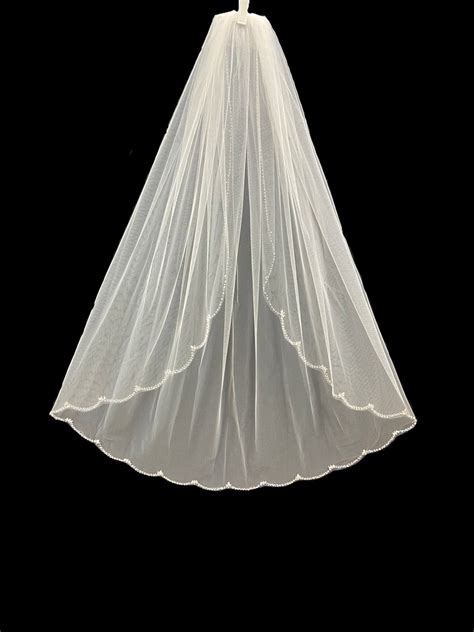 V596 Maritzas Bridal Veils Inc