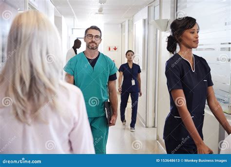 Busy Hospital Corridor With Medical Staff And Patients Stock Image
