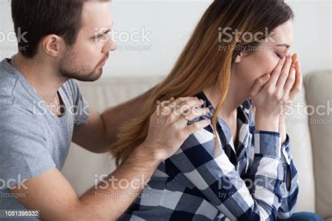 Caring Man Comfort Crying Wife Making Peace After Fight Stock Photo
