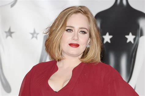 Adele Honors Newly Engaged Couple At London Show