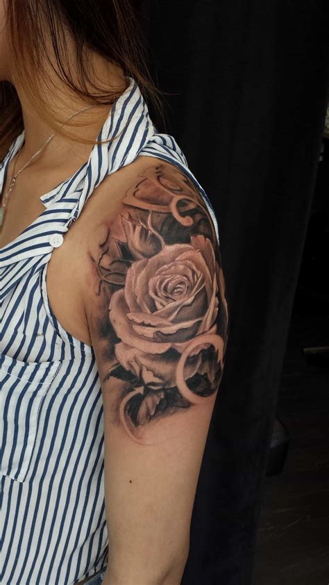 Get daily tattoo ideas on socials. Quarter sleeve black and grey Rose tattoo - Chronic Ink