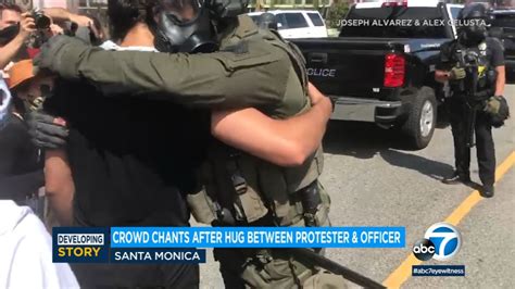 Video Santa Monica Swat Officer Protester Share Hopeful Embrace Abc7 Los Angeles