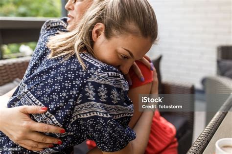 Mother And Daughter Having Bonding Moments And Hugging Each Other Stock