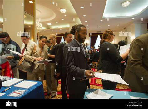 Job seekers attend a job fair in midtown in New York Stock Photo - Alamy