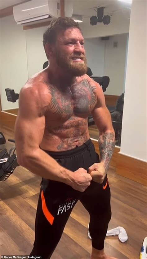shirtless conor mcgregor shows off his jaw dropping muscles and inked skin while training at the