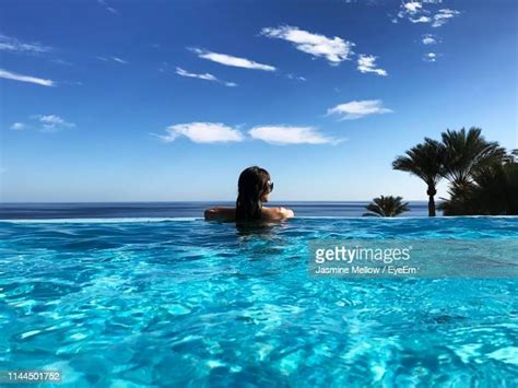 African Woman Infinity Pool Photos And Premium High Res Pictures
