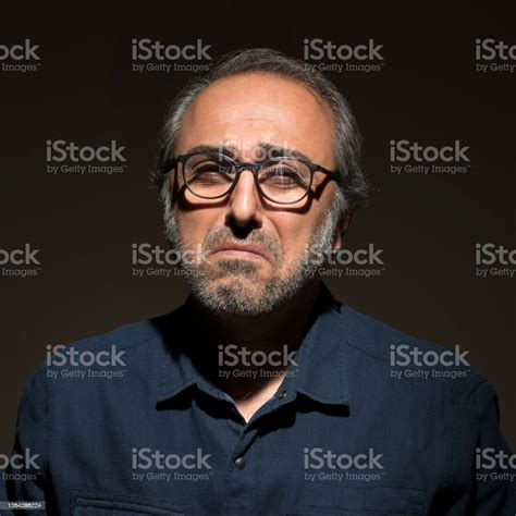 Portrait Of Sad Man Stock Photo Download Image Now Dark Looking At