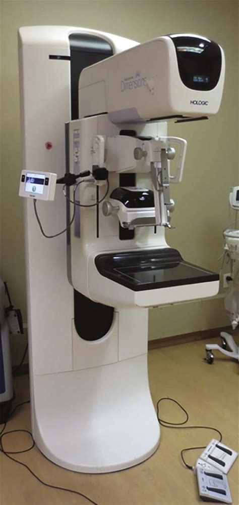 Implementation Of Upright Digital Breast Tomosynthesis Guided