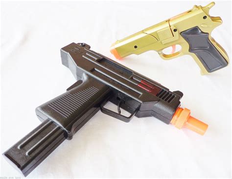 2x Toy Guns Military Detective Uzi Cap Gun And Gold 9mm Pistol Cap Guns