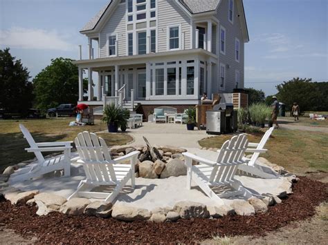 The amount you'll need will depend on the amount of contour you desire. How to Create a Fieldstone and Sand Fire Pit Area | Sand ...