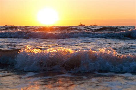 Beautiful Sunrise And Waves On The Sea Sunset On The Baltic Sea Stock