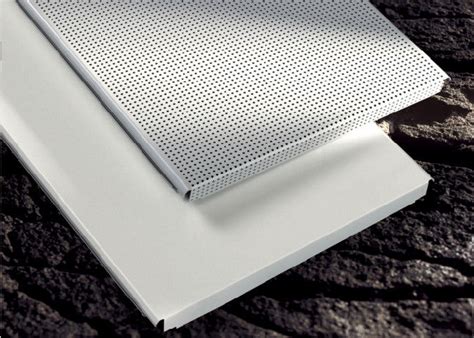 Drop ceiling tiles are a common feature of many workplaces and homes. custom Perforated Metal Ceiling Tiles panels E shaped For ...