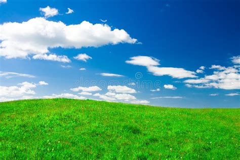 Green Hill Under Blue Cloudy Sky Whit Sun Stock Image Image Of Land