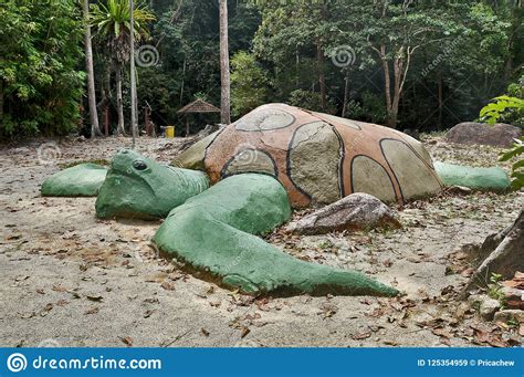 Surrounded by green mountains (gunung angsi) and national reserved forest. Giant Turtle Stone Statue stock image. Image of negeri ...